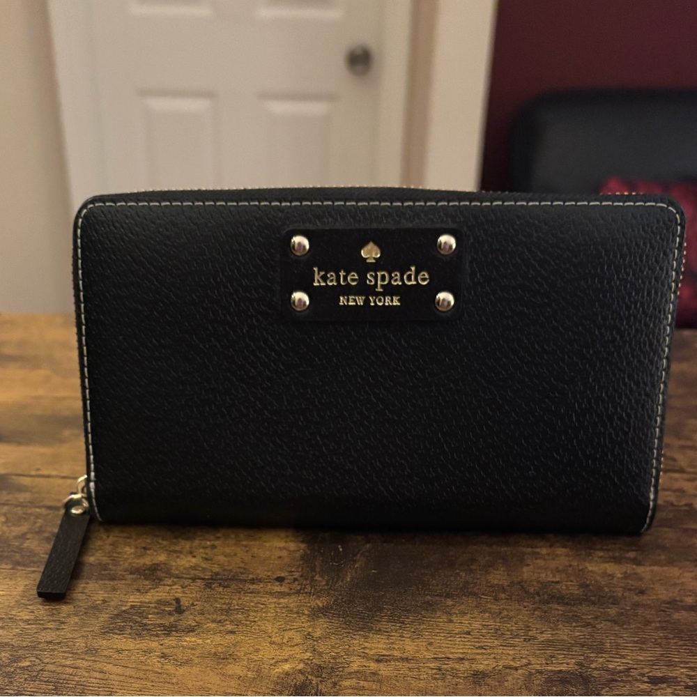 Kate Spade Black Leather  Zip-Around Wallet.  New without tags. Never been used.